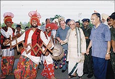 Dr. Murli Manohar Joshi, Union Minister for Human Resource Development posing with bhangra dancers during a function at Punjabi University, Patiala on Tuesday.