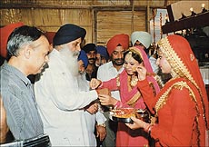 Punjab Chief Minister Parkash Singh Badal being given a traditional welcome on Sunday at Ludhiana. He presided over a function to mark the conclusion of the celebrations of 50 years of Independence.