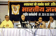 Union Home Minister L.K. Advani, BJP president Kushabhu Thakare, and other BJP leaders at a press conference in Jaipur on Sunday.