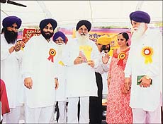 Punjab Chief Minister Parkash Singh Badal launching the scheme for introducing the English language at the primary level, at Chuhar Chak village in Moga on Tuesday.