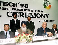 The Punjab Chief Minister, Mr Parkash Singh Badal, is flanked by Mr Rajesh Shah, President, CII, and Mr Rajan Nanda, Chairman, Steering Committee, and Mr Arun Bharat Ram, Chairman, CII, northern region, at the inaugural ceremony of Agro Tech '98 in Chandigarh on Wednesday.