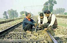 A team of the Railways on repair job.