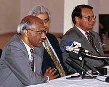 Indian Foreign Secretary K. Raghunath speaks to journalists during a briefing with his Pakistani counterpart Shamshad Ahmed and Pakistani spokesman Tariq Altaf in Islamabad 