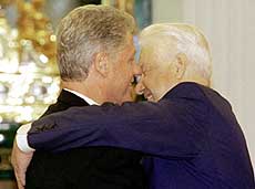 MOSCOW : Russian President Boris Yeltsin (right) hugs US President Bill Clinton at Moscow's Kremlin on Tuesday at the start of a two-day summit expected to be overshadowed by discussion on Russia's worst crisis in years.