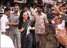 Congress President Sonia Gandhi being greeted by crowds during her visit to Mahatma Gandhi Chowk in Pachmari on Saturday.