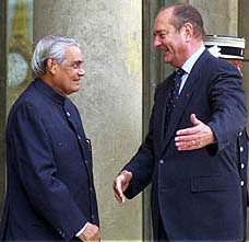 Prime Minister Atal Behari Vajpayee with French President Jacques Chirac at the Elysee Palace in Paris on Tuesday. — PTI photo