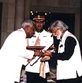 The President conferring the Padma Vibhushan on artist Satish Gujral