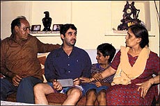 Mr Neeraj Gujral (second from left) with his family at home in Sector 22 after a harrowing experience of being drugged, robbed and dumped .