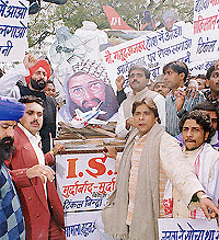 Demonstrators under the banner of Rajiv Gandhi Sadbhavana Manch demonstrate in New Delhi, Monday, against Pakistans and ISI's continued support to militant outfits in India. - Photo by Sondeep Shankar