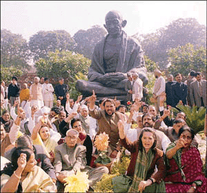Congress President Sonia Gandhi along with her party MPs stages dharna inside the Parliament House complex .