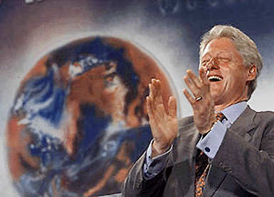 US President Bill Clinton laughs before addressing the business community in Hyderabad on Friday. — AFP