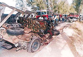 A mangled Sumo after it collided with a truck, killing three persons, near the level-crossing of Dera Bassi town in Patiala district on Sunday. — Tribune photo by Manoj Mahajan