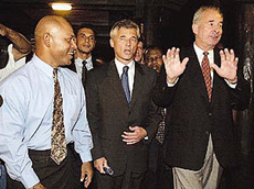Rebel leader George Speight, left, United Nations representative Sergio De Mello, and the Secretary General of the Commonwealth Don McKinnon, right, depart from a meeting at the Fiji Parliament, on Wednesday. The parties are meeting following the Great Council of Chiefs second day of meetings to decide how to handle the six-day-old coup led by Speight. 