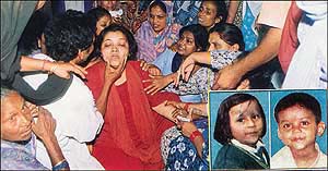 A wailing Bimala, mother of nine-year-old Hena and six-year-old Abhishek (inset), who were murdered in Jalandhar on Friday.