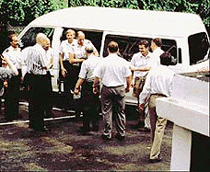 The aircrew of a Latvian aircraft come out of a van at the Russian Consulate in Calcutta after being set free from a jail on Saturday.