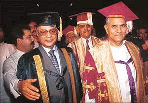 Mr Mahendra Pal Chaudhry, deposed Prime Minister of Fiji, is escorted by the Chancellor of Maharshi Dayanand University, Babu Parmanand, in the convocation procession before an honorary doctorate was conferred on him in Rohtak on Thursday.