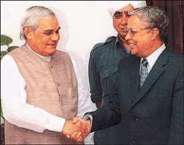 Prime Minister Atal Behari Vajpayee welcomes Fijis deposed Prime Minister Mahendra Pal Chaudhry at Hyderabad House in New Delhi on Friday.