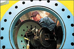 Norwegian diver Paul Stefan Dinessen closes the hatch while testing the decompression chamber on board the MV Seaway Eagle in the Barents Sea on Sunday.