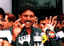 Kapil Dev talks to mediapersons after coming out of the CBI office in New Delhi on Thursday.