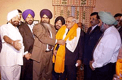 Prime Minister Atal Behari Vajpayee with members of the Sikh community in New York on Tuesday.