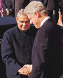 U.S. President Bill Clinton welcomes Prime Minister Atal Behari Vajpayee on the South Lawn of the White House on Friday. ---- Reuters photo
