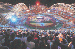 More than 1,00,000 persons wave lights during the closing ceremony of the Sydney Olympic Games on Sunday.