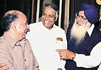 Union Finance Minister Yashwant Sinha and Consumer Affairs and Public Distribution Minister Shanta Kumar with Punjab Chief Minister Parkash Singh Badal in New Delhi on Sunday. 