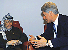 US President Bill Clinton and Palestinian President Yasser Arafat at a bilateral meeting which lasted five minutes on Monday in the Sharm-el-Sheikh resort hotel on the Red Sea held before the West Asia Summit.