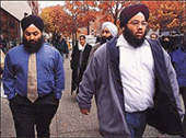 Two sons of Ripudaman Singh Malik, Jaspreet (left) and Darsham (right), leave Vancouver court on Monday after their father appeared on murder charges for the 1985 bombings of an Air India jet over the Atlantic and a related bombing at Tokyos Narita airport.