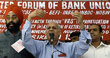 Workers raise slogans in front of the State Bank of India in New Delhi on Wednesday. More than one million bank employees went on a one-day token strike in protest against privatisation of the public sector banks.
