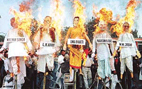 Activists of the Regional Samajbadi Party burn effigies of leading BJP leaders in Calcutta