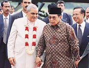 Prime Minister Atal Behari Vajpayee with Indonesian President Abdurrahman Wahid on his arrival in Jakarta on Wednesday.