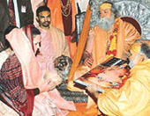 The Leader of the Opposition, Mrs Sonia Gandhi, makes offerings during the "Mahakumbh Mela" in Allahabad on Monday. 