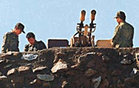 Defence personnel install an anti-aircraft gun as part of the security arrangement for the Republic Day celebrations in Delhi on Thursday. 