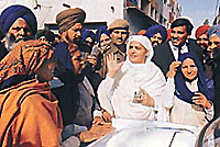 Bibi Jagir Kaur waves to her supporters after being granted bail by the CBI court in Patiala on Tuesday.