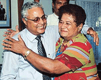 Ousted leader of Fiji Mahendra Chaudhry, the nations first ethnic Indian Prime Minister, hugs former member of his Cabinet Lavinia Padrath after he gave a press conference in Suva on Wednesday following his meeting with Fiji President Ratu Josefa Iloilo.