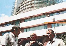 Fear and anxiety grip a group of small investors outside the BSE building as the stock markets continued to be volatile. 