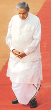 Prime Minister Atal Behari Vajpayee in a pensive mood as he strolls in front of Rashtrapati Bhavan in New Delhi on Wednesday.