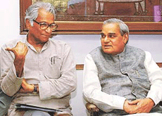 Prime Minister Atal Behari Vajpayee with Samata Party leader George Fernandes at the National Democratic Alliance meeting in New Delhi on Friday.