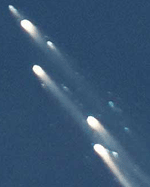 Pieces of the Russian space station Mir race across the sky above Fiji as they descend into the earths atmosphere on Friday.