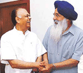 The Deputy Chairman of the Planning Commission, Mr K. C. Pant, with Punjab Chief Minister Parkash Singh Badal in New Delhi on Thursday.