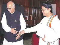 Union Home Minister L.K. Advani with dissident Trinamool Congress leader Ajit Panja at his office in New Delhi on Saturday.