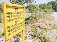 The Armys warning notice in Hindi prohibits the construction of any building within the 1000- metre vicinity of the ammunition depot at Pathankot.