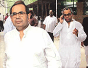 Prakash Hinduja (left) accompanied by his brother, Srichand Hinduja, leaves a trial court in New Delhi on Friday.