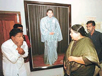 J. Jayalalitha rebukes a party worker for barging into a party meeting in Chennai on Monday. 