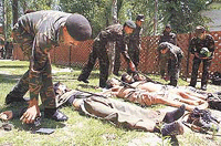 Bodies of four militants inside an Army camp at Patan, 30 km north of Srinagar.