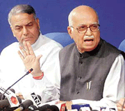 Union Home Minister L.K. Advani with Finance Minister Yashwant Sinha addressing a Press conference on reforming the national security system in New Delhi on Wednesday