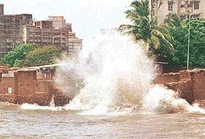 Fishermens colony along the coast at Cuffe Parade off Arabian Sea inundated by sea waters on Friday evening as a result of cyclone hitting the coast in Mumbai. 