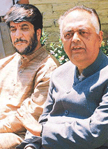 Shabir Ahmad Shah, Chief of the Jammu and Kashmir Democratic Freedom Party, looks on as Mr K.C. Pant speaks during a news briefing after their meeting in Srinagar on Tuesday.