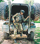An Army jawan comes out of a casper, a mine protecting vehicle, after an operation in north Kashmir on Thursday. 